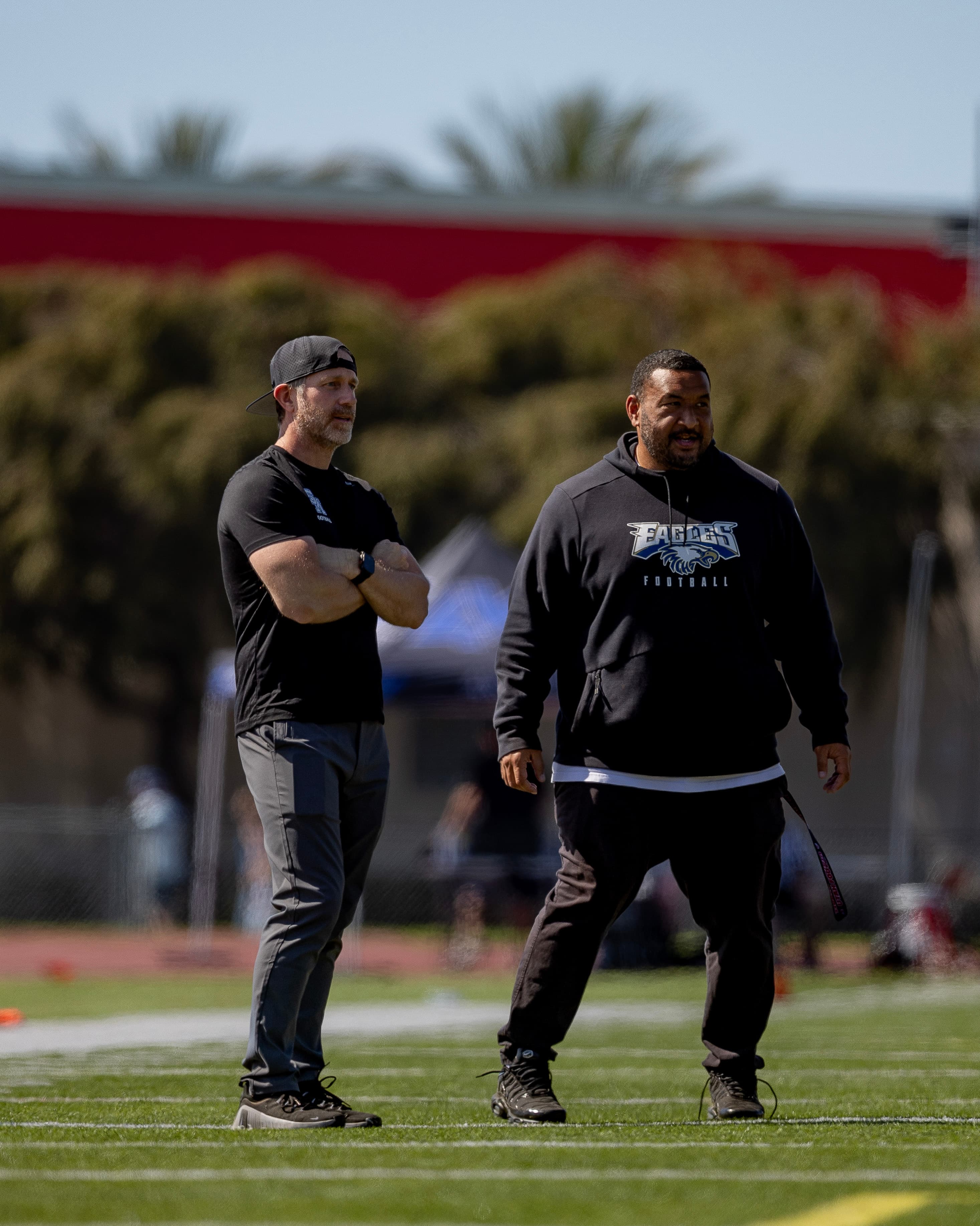 Coaches on the field